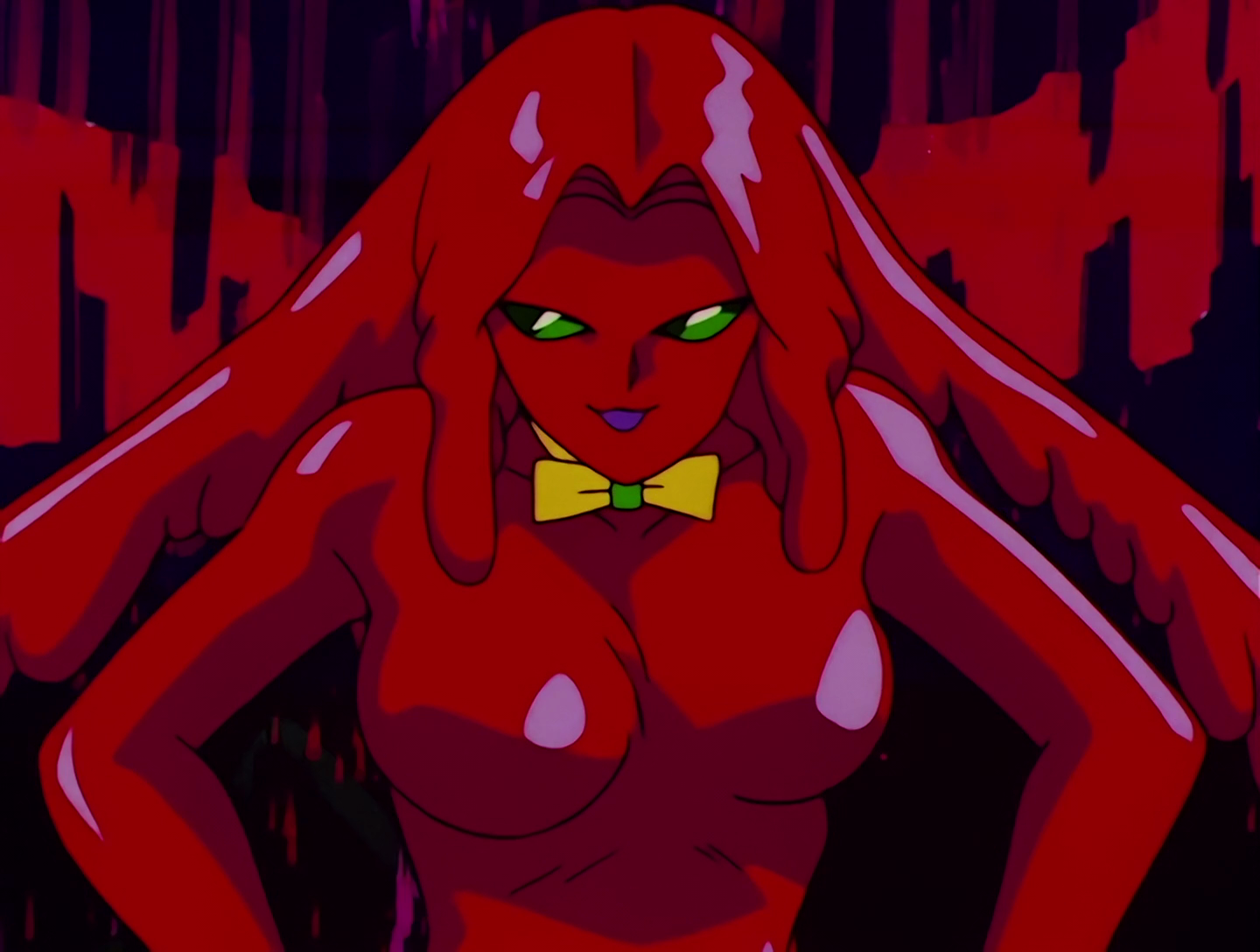 Jamanen, a Droid from Sailor Moon episode 65. She seems to be made entirely out of red goo. She has green eyes and wears a yellow and green bow tie.
